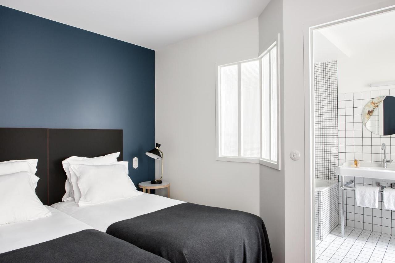 Newhotel Le Voltaire Parigi Esterno foto
